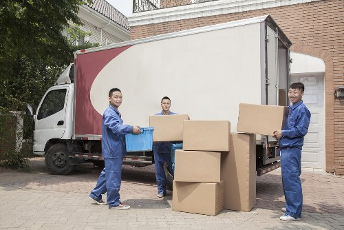 Man and van pricing in Camden with a moving van near local housing