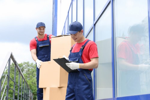 Local movers handling office furniture in Camden