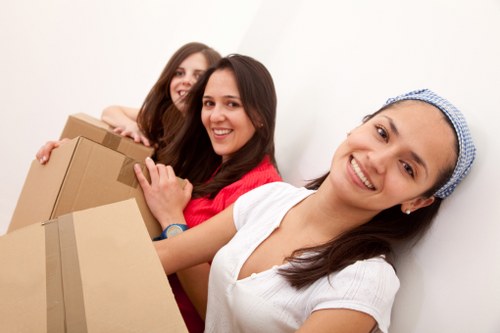 Packing and loading belongings for a Camden house move with furniture protection