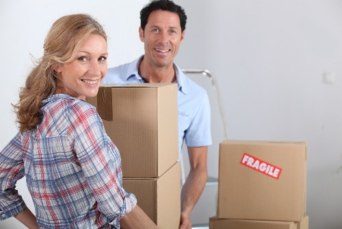 Professional office move setup with labelled boxes and organised office furniture in Camden